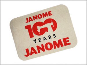 Tapete Pequeno comemorativo de 100 anos para máquina de costura Janome - 103294005